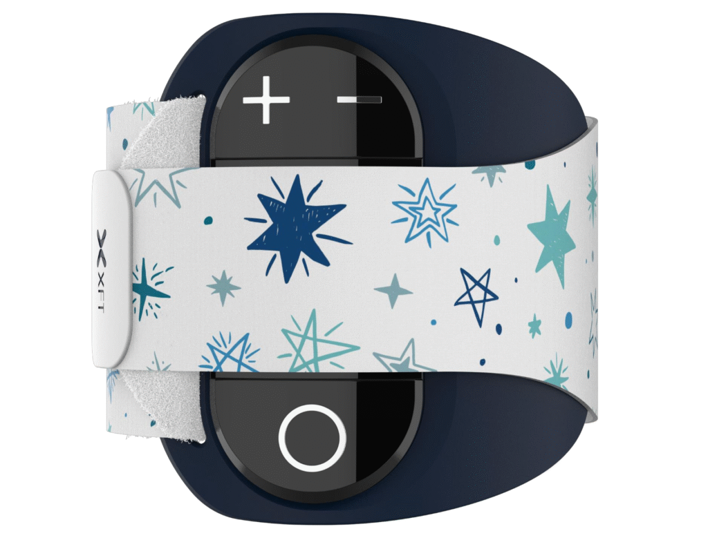 Picture of a black leg muscle stimulator with a white strap and blue stars on the strap